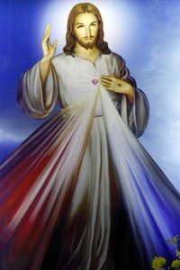 Laden, der religiöse christliche Artikel verkauft. Barmherziger Jesus, ich vertraue auf dich. Ho-Chi-Minh-Stadt. Vietnam