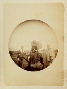Frau reitet auf einem Esel, um 1890