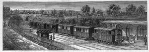 Anwendung von Faure-Batterien: Elektrischer Zug auf einer Eisenbahnstrecke in einem Bahnhof. Gravur in „Le Monde Illustré“.