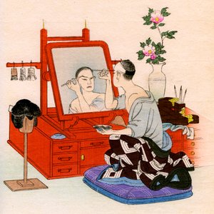 Traditionelles japanisches Theater: ein Schauspieler schminkt sich in seiner Garderobe von Yoshimune Arai