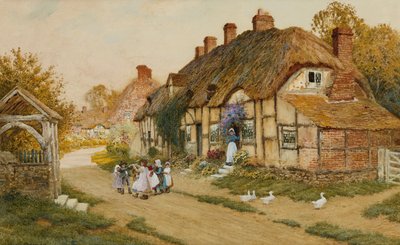Kinder spielen vor einem Cottage in einem Dorf von Arthur Claude Strachan