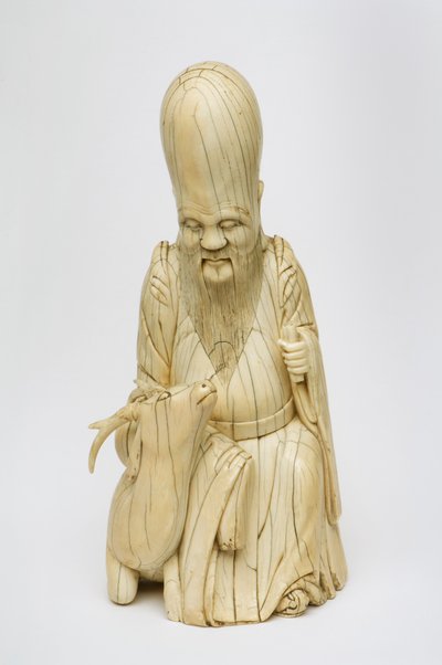 Geschnitzte Elfenbeinfigur von Shou Xing, sitzend mit Hirsch, ca. 1580-1644 von Chinese School