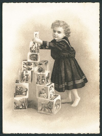 Kind spielt mit Bauklötzen von English School