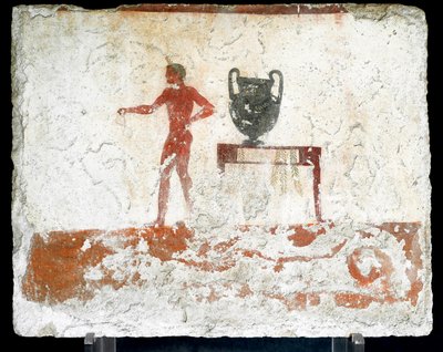 Etruskische Kunst: Ein junger nackter Ephebe neben einem Tisch mit einer Vase (Fresko aus dem Grab des Tauchers) von Etruscan