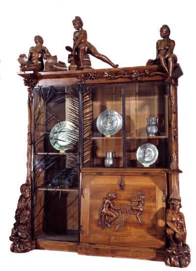 Möbel: Bücherregal aus Walnuss und Schmiedeeisen von Francois Hubert Carabin, 1890. Musée d