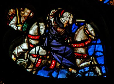 Das Westrosenfenster zeigt eine Szene aus dem Buch der Offenbarung: Treu und wahrhaftig, der König der Könige auf einem weißen Pferd, mit zwei weiteren Kriegern dahinter (19:11-16). von French School
