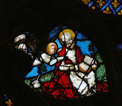 Das westliche Rosenfenster zeigt eine Szene aus dem Buch der Offenbarung: Öffnung des ersten Siegels, mit dem Engel des Matthäus (6:1). von French School
