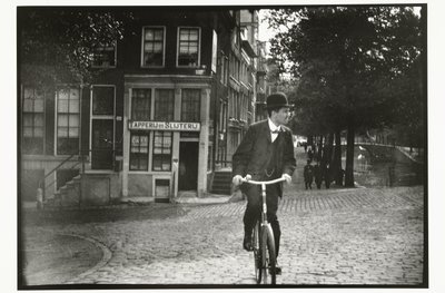Radfahrer auf der Keizersgracht in Amsterdam von George Hendrik Breitner