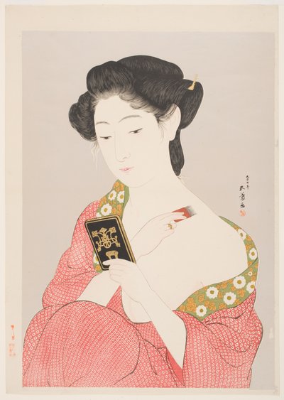 Eine Frau im Nagajuban, die ihren Hals pudert von Goyo Hashiguchi