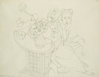Sitzende Frau mit Vase Tulpen von Henri Matisse