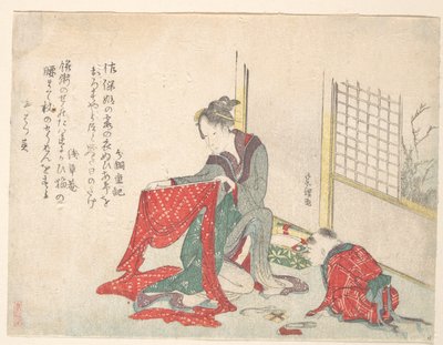 Frau, die Stoff faltet von Katsushika Hokusai