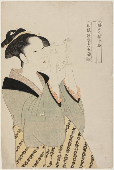 Frau, die einen Brief liest, aus der Serie Zehn Klassen der Physiognomie von Frauen (Fujo ninso juppon) (Fumi yomu onna) von Kitagawa Utamaro