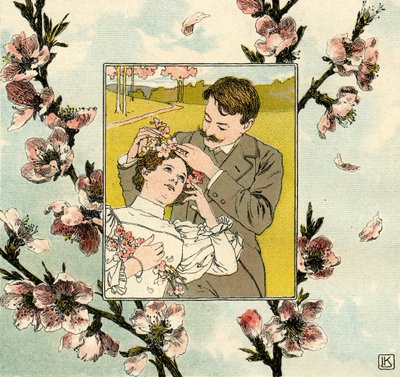 Mann steckt Frühlingsblüte in das Haar einer jungen Frau von Leo Kainradl