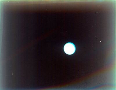 Uranus mit den Satelliten Miranda, Ariel und Umbriel, von Voyager 2, 24. Januar 1986 von NASA Images