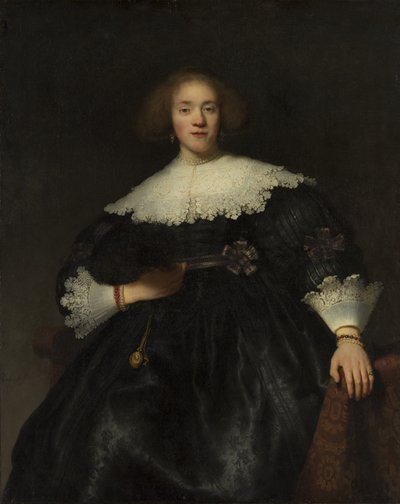 Porträt einer jungen Frau mit einem Fächer von Rembrandt van Rijn