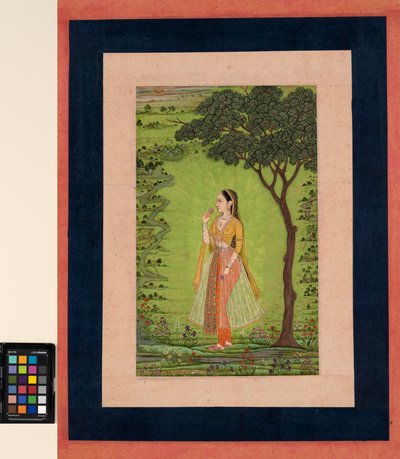 Eine Frau steht an einem Baum und hält eine Blume von School Mughal