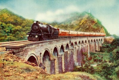 Zwischen Bombay und Delhi. Ein beeindruckender Blick auf den Frontier Mail, der über ein Viadukt fährt, 1935 von Unbekannt