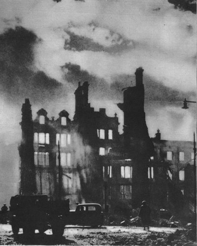 Die Morgendämmerung bricht an und findet die Stadt nach einer Höllennacht verwandelt von Unbekannt
