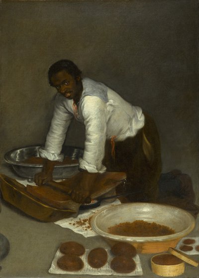 Ein Mann schabt Schokolade von Unknown artist