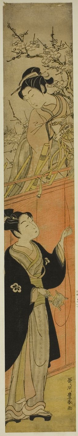 Junger Mann und Frau mit einem Drachen von Utagawa Toyoharu