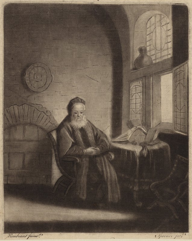 Ein älterer bärtiger Philosoph sitzt an einem Schreibtisch vor einem Fenster von Rembrandt van Rijn