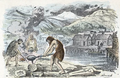 Prähistorie, Bronzezeit: Gießerei-Werkstatt in der Nähe einer Pfahlbausiedlung. Gravur aus „La nature et l