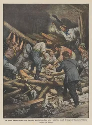 Ein italienischer Arbeiter nach zehn Tagen unter den Felsen des Tunnels lebend geborgen