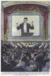 Eine kuriose Neuheit im Kino, die Orchester werden vom Bildschirm geleitet