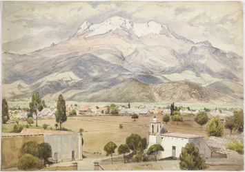 Dorf im Vordergrund und Berge dahinter