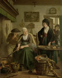 Frau backt Pfannkuchen