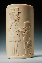 Plakette mit Figuren eines europäischen Mannes und einer afrikanischen Frau, Kongo
