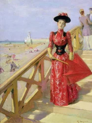 Frau geht die Stufen hinunter zum Strand