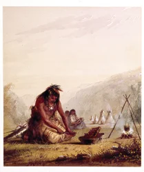 Shoshone-Indianer bereitet seine Mahlzeit zu