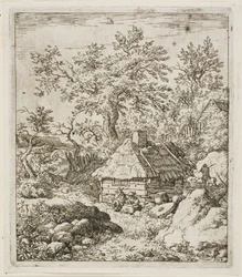 Reetgedeckte Hütte zwischen Bäumen und Felsen