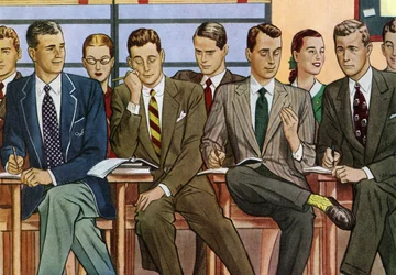 Schüler an Schreibtischen in einem College-Klassenzimmer der 1940er Jahre