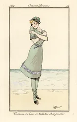 Frau am Strand im Badeanzug aus zweifarbigem Taft
