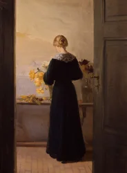 Mädchen arrangiert Blumen
