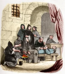 Inquisition in Spanien im 15. Jahrhundert: Maria von Burgund (1457-1482), die beschuldigt wird, Jüdin zu sein, wird von dem spanischen Inquisitor, dem heiligen Petrus (Pedro) von Arbués (1441/1442-1485), gefoltert: Er verbrennt ihre Füße. Illustration in