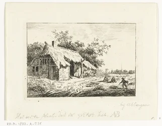 Bauer macht Heu vor einem Bauernhof bei Ubbergen