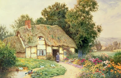 Ein Cottage an einem Ententeich