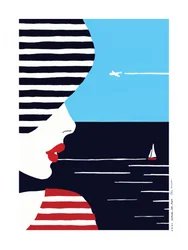 Frau schaut aufs Meer