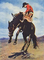 Cowboy reitet auf einem bockenden Bronco