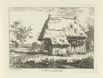 Schäfer bei einem Schafstall