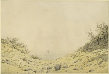 Blick durch Dünen auf das Meer