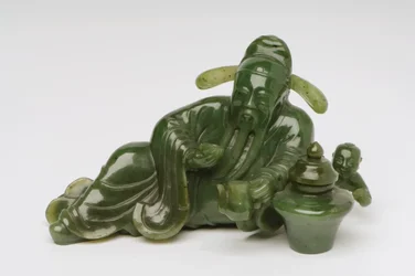 Liegende chinesische Gelehrtenfigur