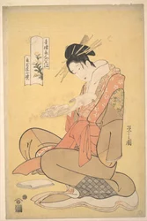 Die Oiran Komurasaki aus dem Kadotamaya beim Lesen eines Briefes