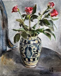 Rosa Rosen in einem bemalten Topf