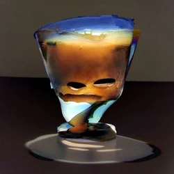 Schmelzendes Glasgesicht