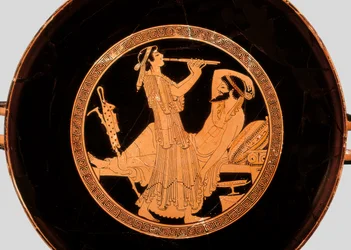 Bankett und Doppelflötenspieler, Detail von einer Kylix oder attischen rotfigurigen Schale, ca. 490 v. Chr.