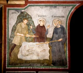 Das Wunder des Goten. Der heilige Benedikt von Nursia traf in Begleitung des heiligen Maurus, seines ersten Schülers, einen gotischen Bauern und reparierte auf wundersame Weise dessen Hippe. Fresko von Meister Consolo (13. Jahrhundert). Unterkirche.